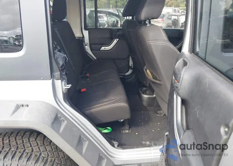 2014 Jeep Wrangler Unlimited Sahara z USA, uszkodzony, nr VIN 1C4BJWEG2EL138028